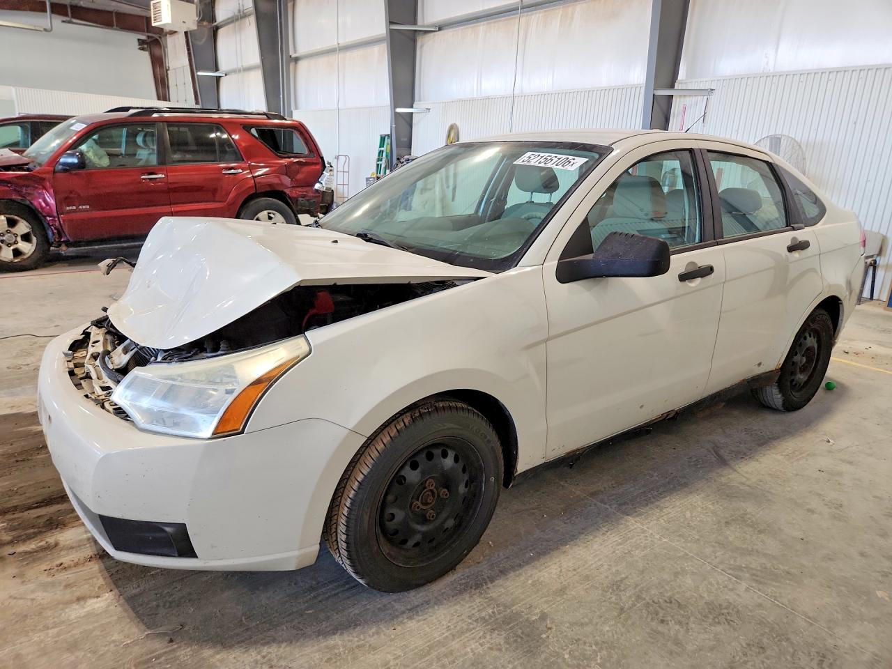 2010 Ford Focus S, VIN 1FAHP3EN7AW140913 — Front end