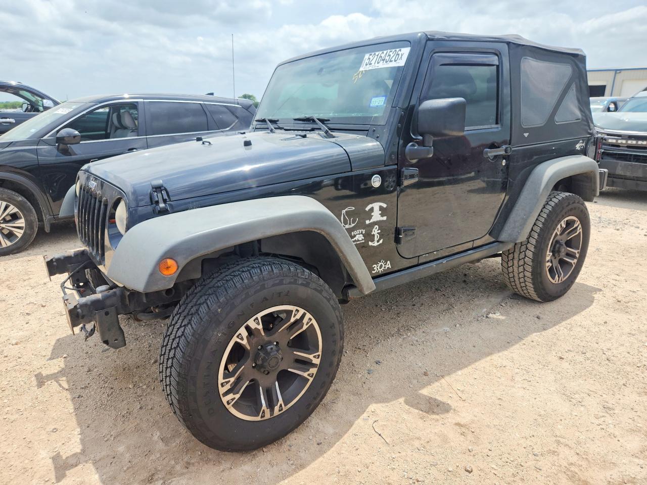 2012 Jeep Wrangler Sport, VIN 1C4AJWAG9CL136775 — Front end