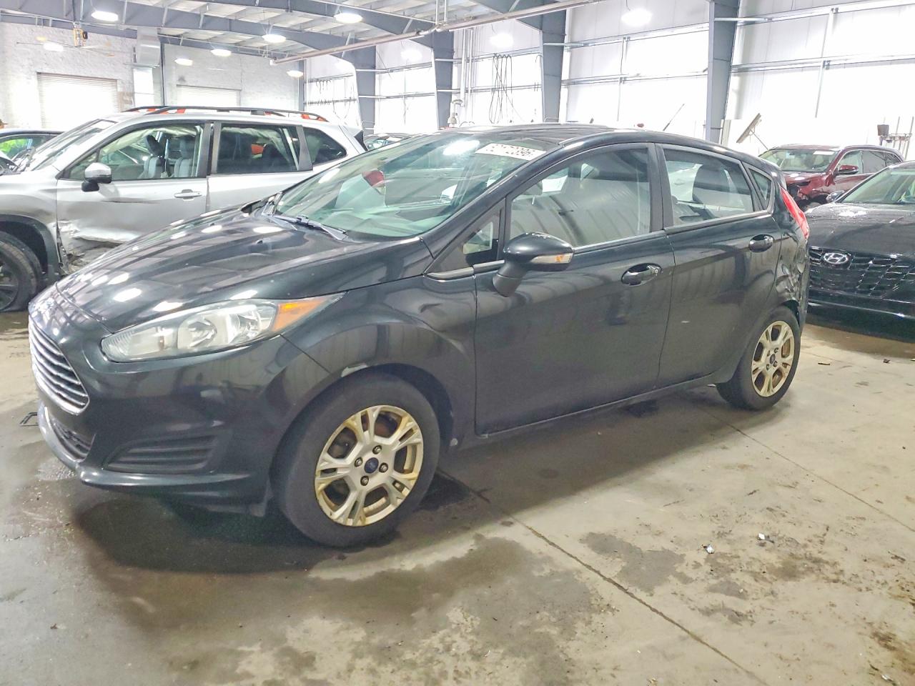 2014 Ford Fiesta SE, VIN 3FADP4EJ2EM102660 — Rear end