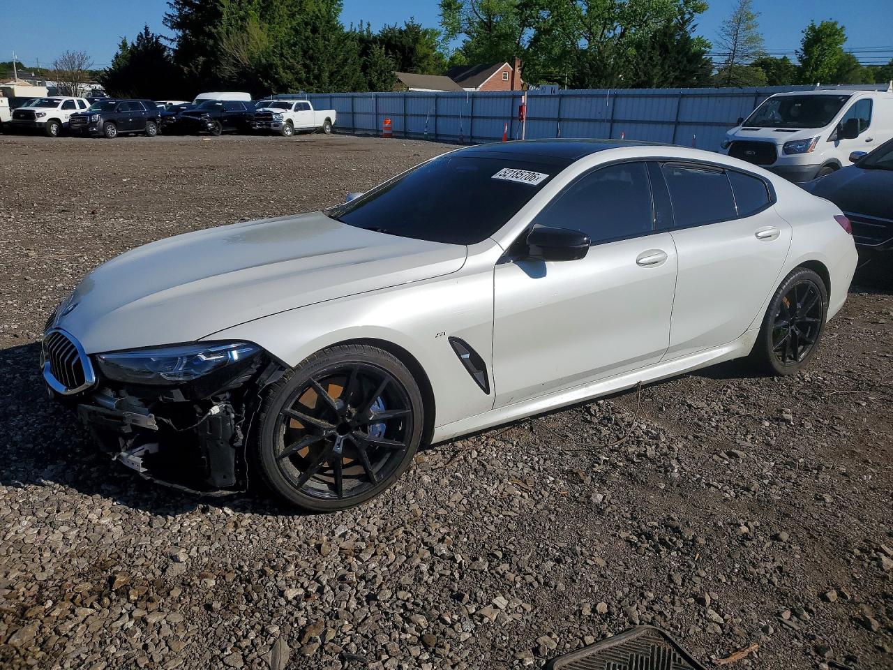 2020 BMW 8 Series 840i, VIN WBAGV2C08LBP44572 — Side