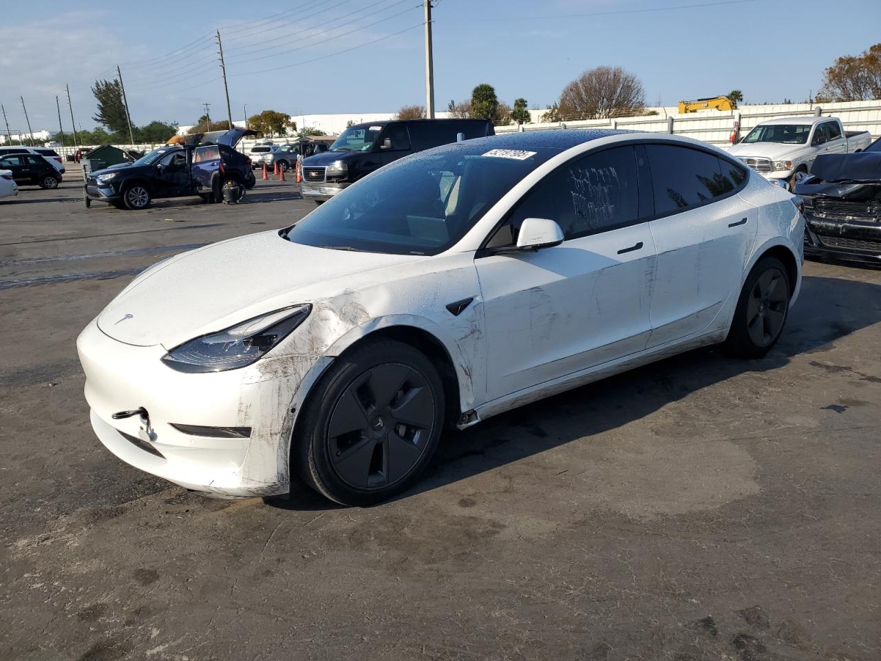 2022 Tesla Model 3 Long Range, VIN 5YJ3E1EBXNF237537 — Side