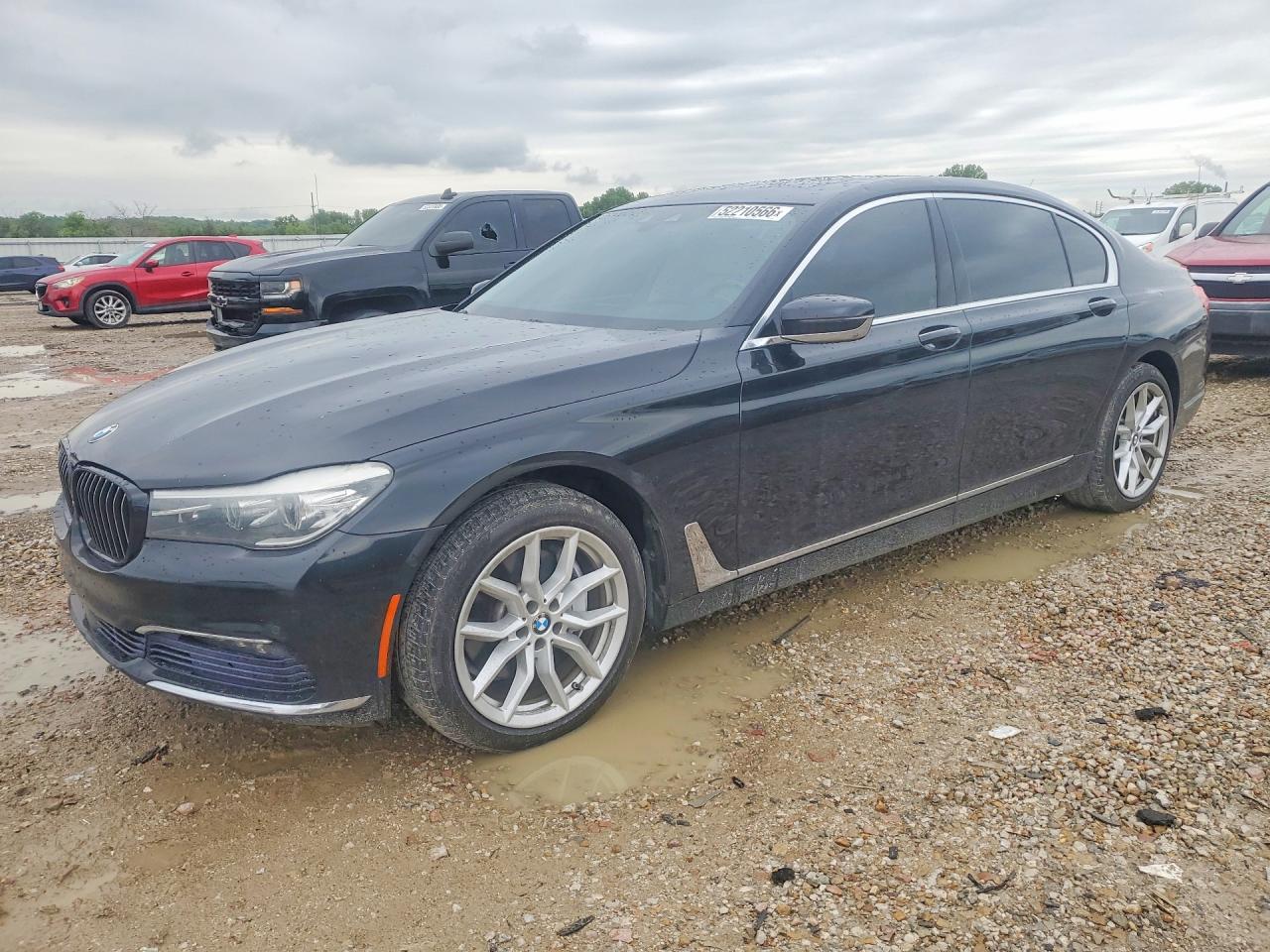 2016 BMW 7 Series 740i, VIN WBA7E2C50GG714437 — Hail