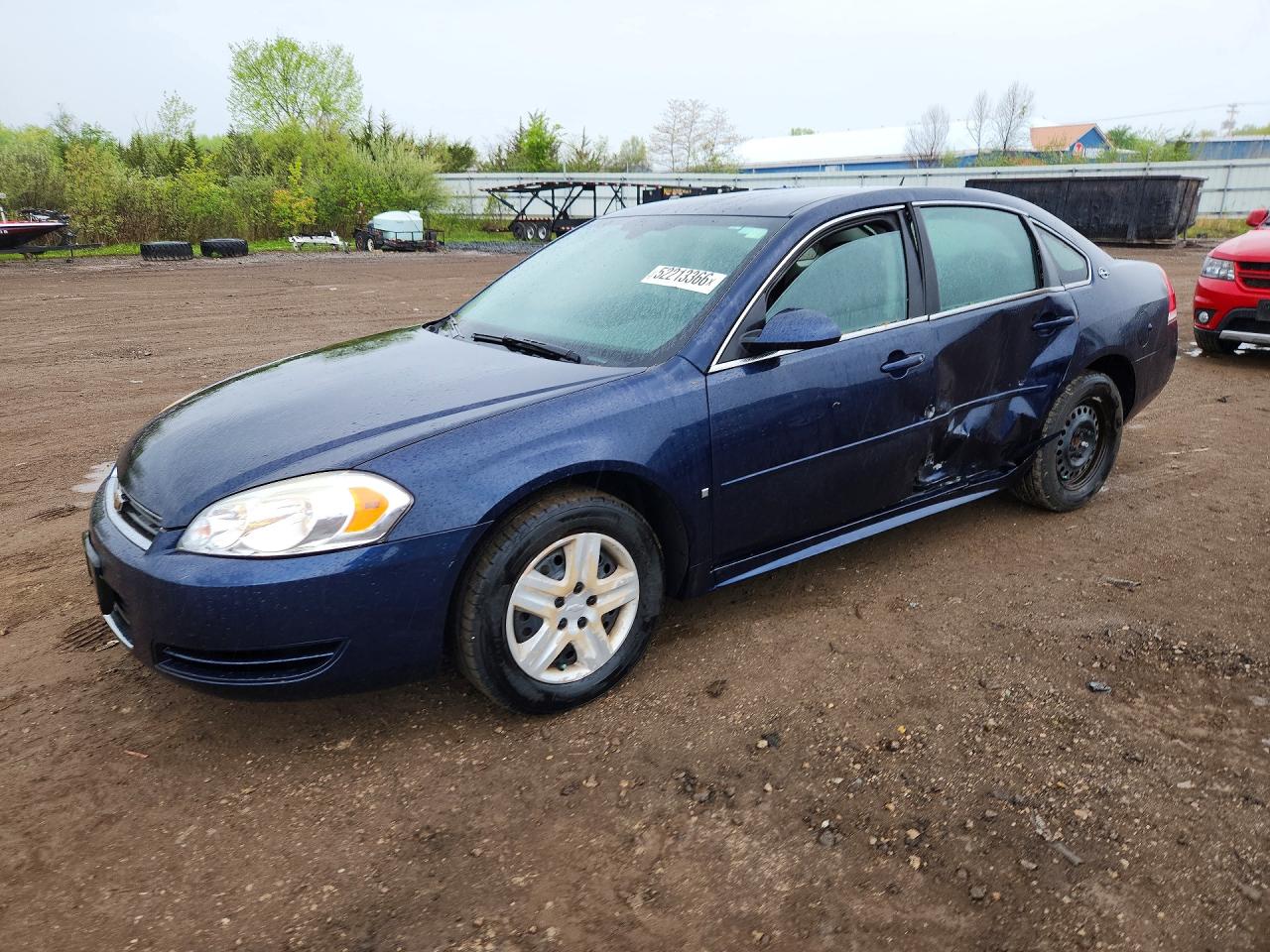 2009 Chevrolet Impala LS, VIN 2G1WB57KX91158445 — Side