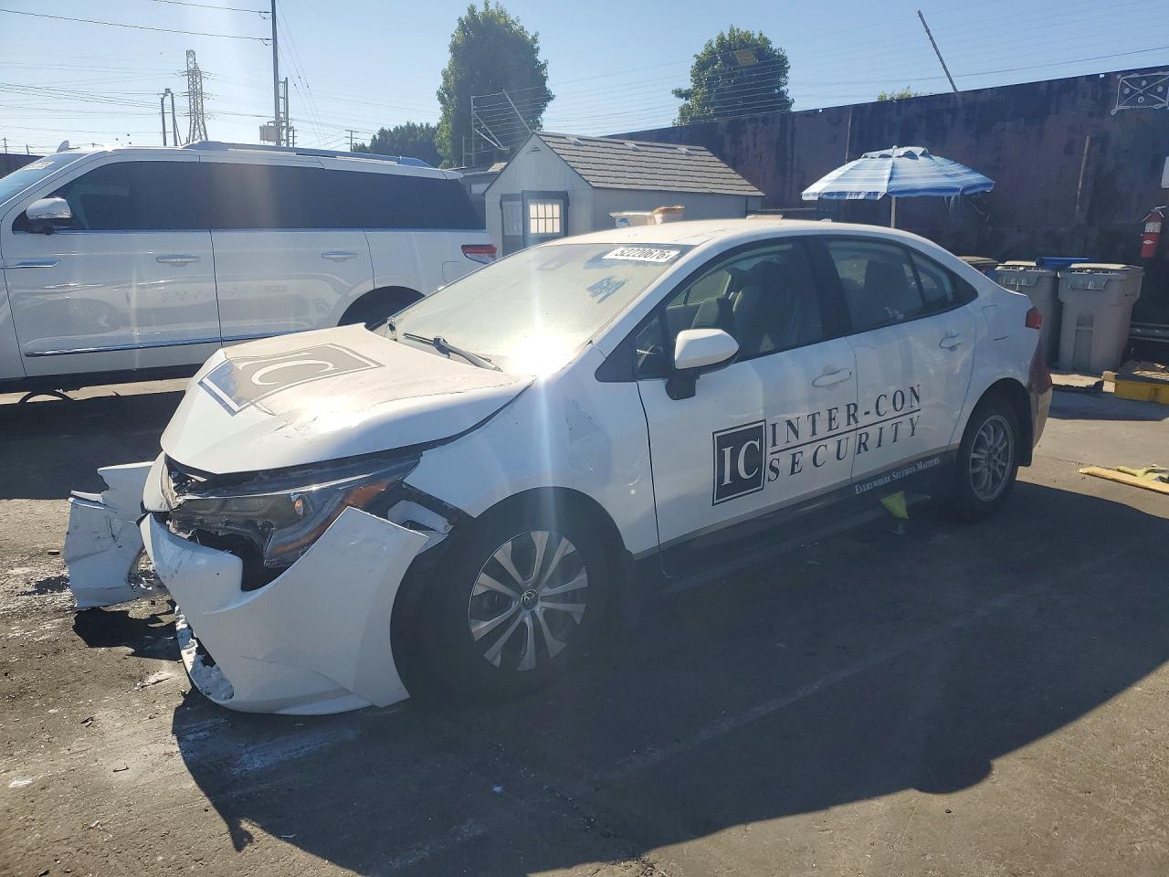 2020 Toyota Corolla Hybrid LE, VIN JTDEBRBE1LJ022259 — Front end