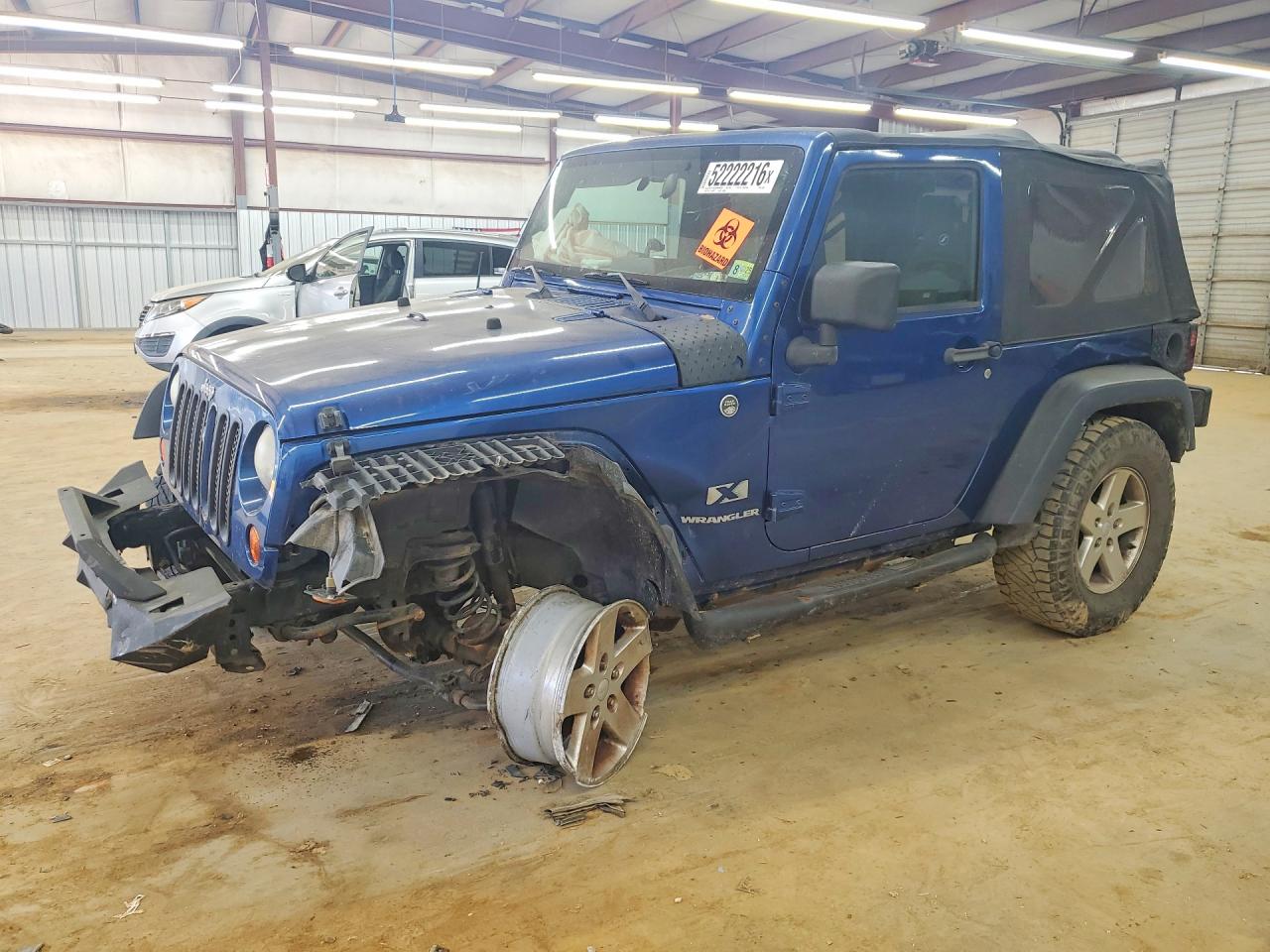 2009 Jeep Wrangler X, VIN 1J4FA24199L745521 — Front end