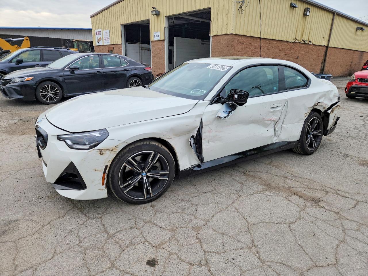 2024 BMW 2 Series 230i xDrive, VIN 3MW33CM02R8E57182 — Side