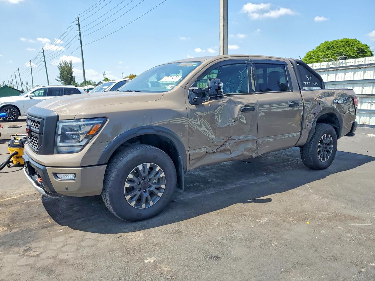2024 Nissan Titan Platinum Reserve, VIN 1N6AA1ED9RN104101 — Ранее повреждён