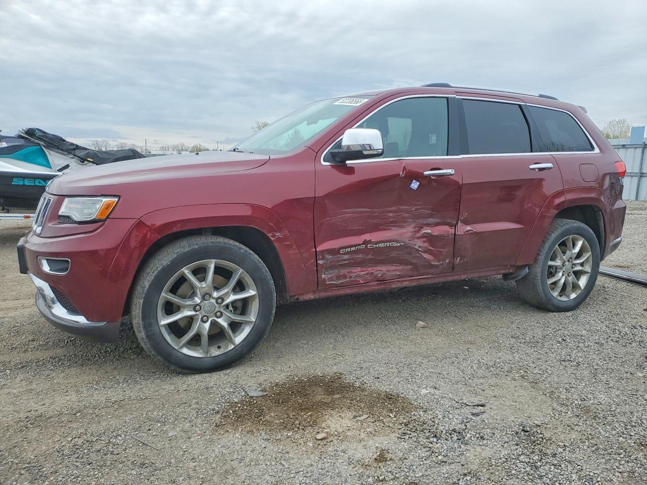 2016 Jeep Grand Cherokee Summit, VIN 1C4RJFJM4GC376363 — Side