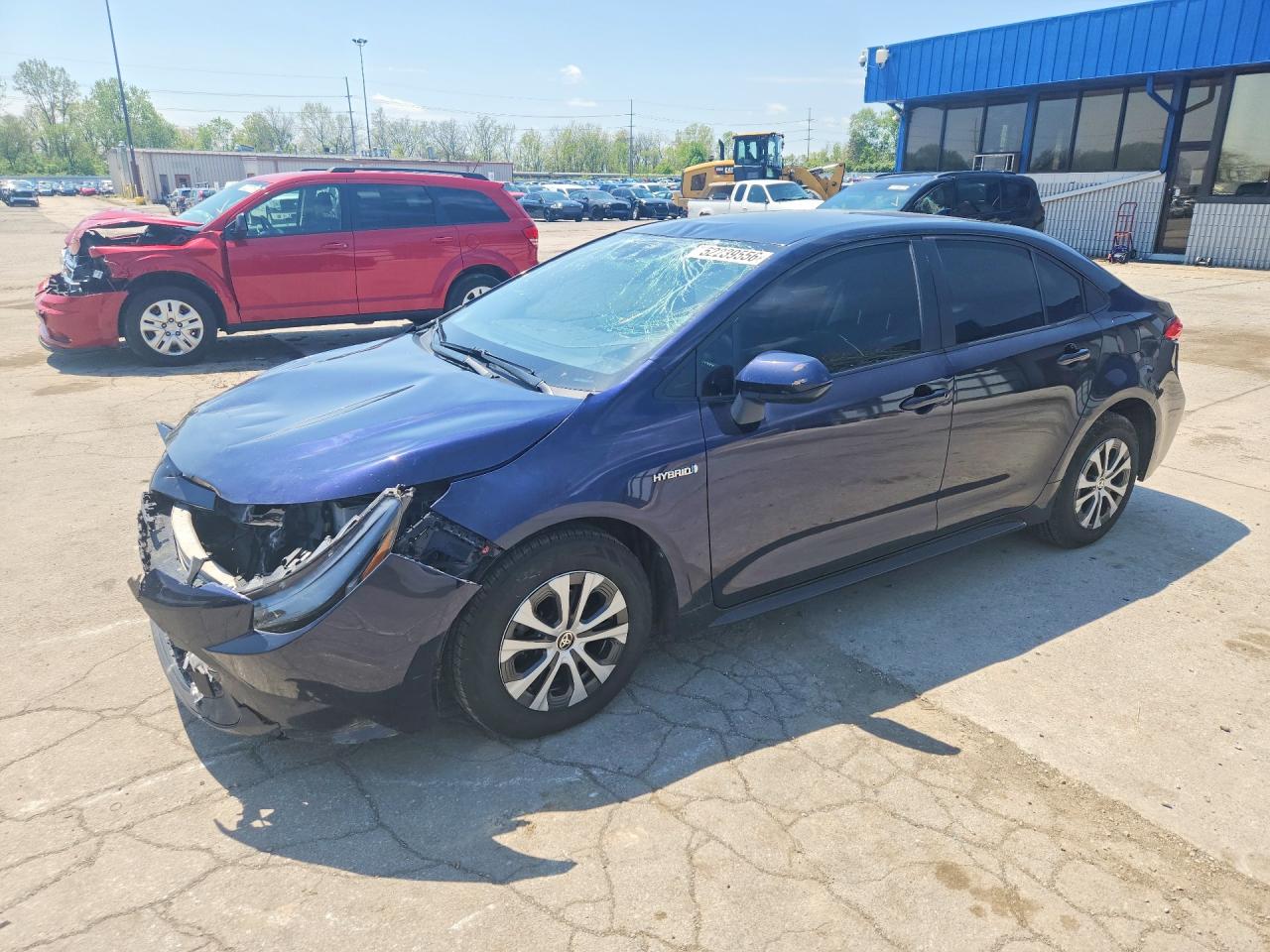 2021 Toyota Corolla Hybrid LE, VIN JTDEAMDE9MJ014690 — Front end