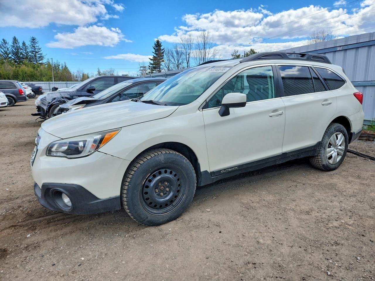 2016 Subaru Outback, VIN 4S4BSCAC0G3231546 — Side