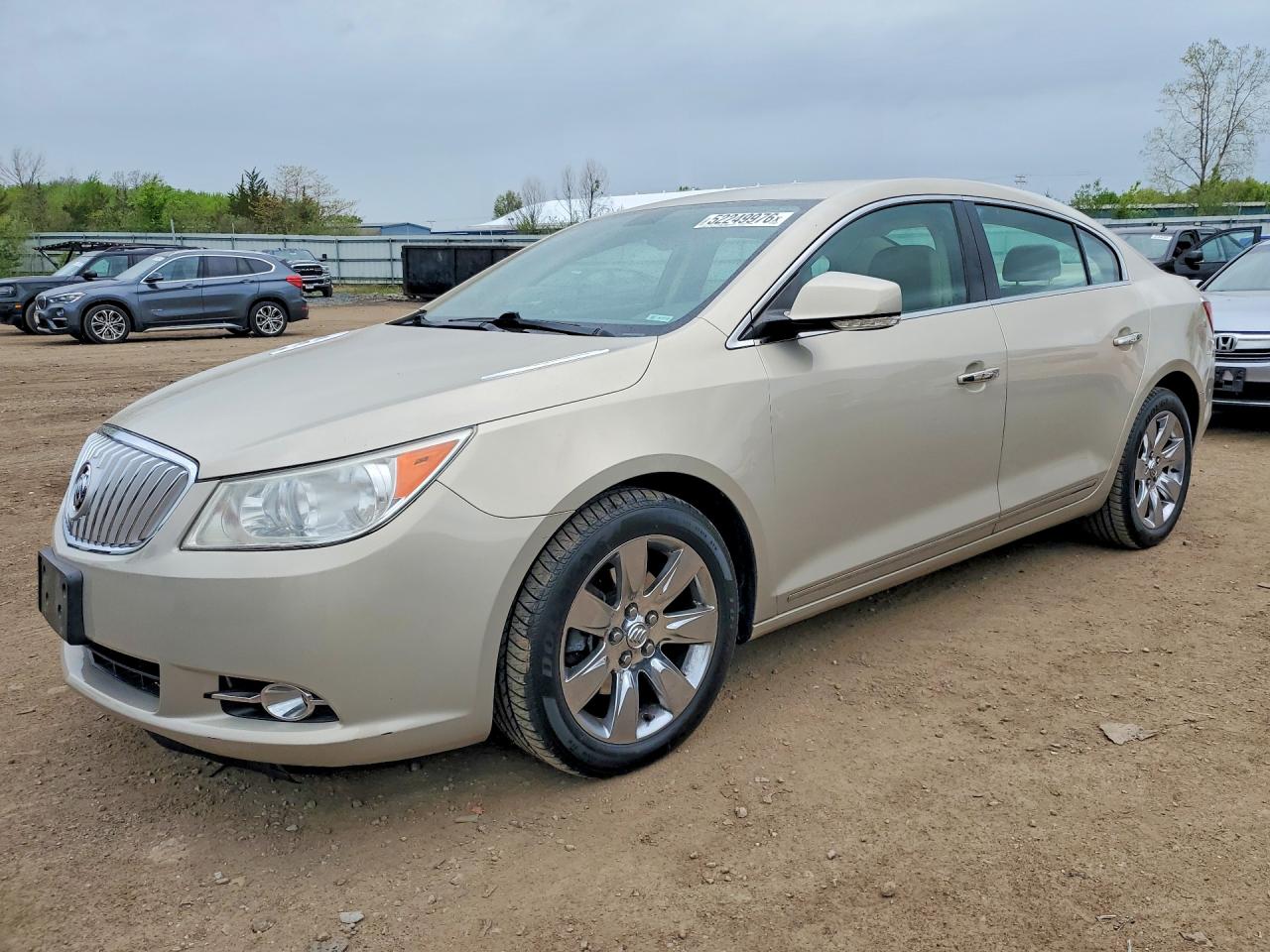 2011 Buick LaCrosse CXL, VIN 1G4GC5EDXBF345241 — Hail