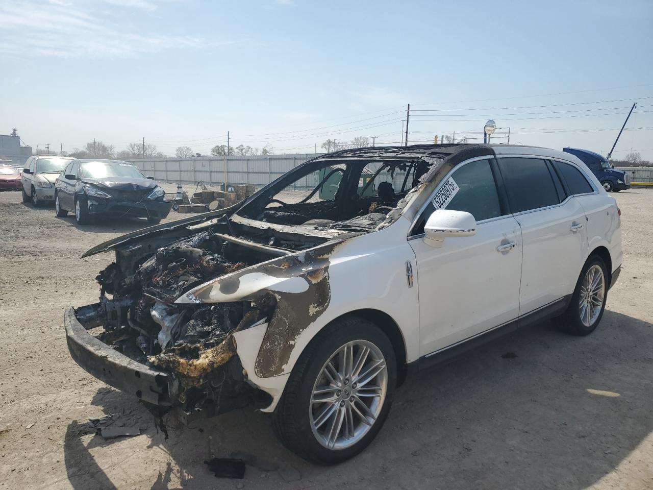 2013 Lincoln MKT EcoBoost, VIN 2LMHJ5AT4DBL51360 — Engine fire
