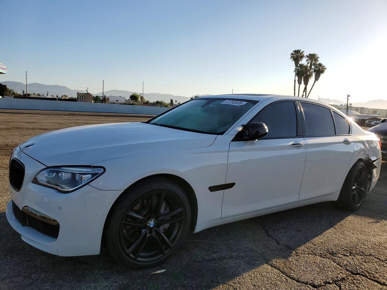 2013 BMW 7 Series 740i, VIN WBAYA6C50DC995312 — Rear end