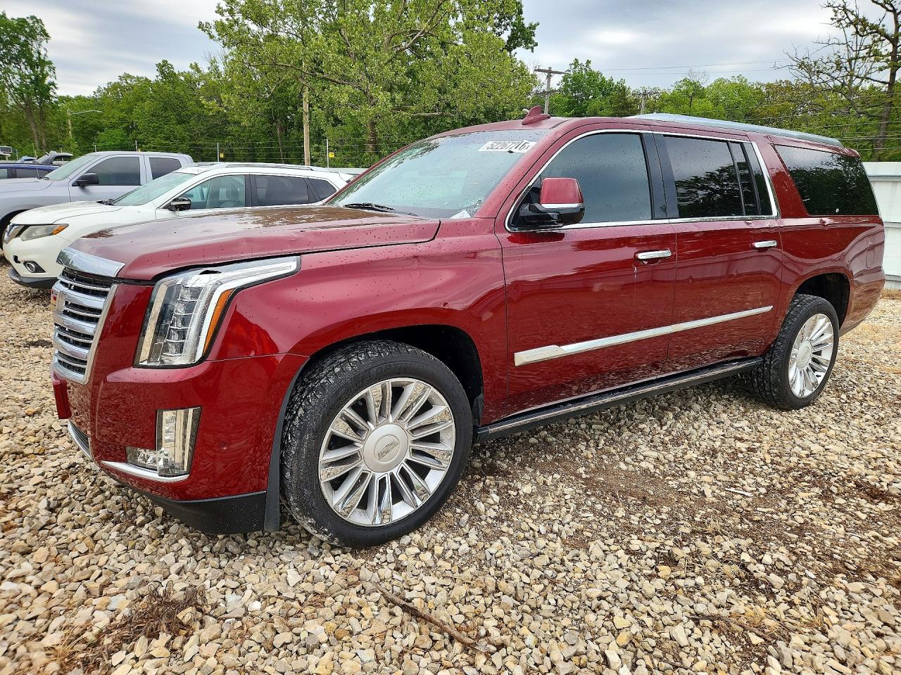 2017 Cadillac Escalade ESV Platinum, VIN 1GYS4KKJ9HR130570 — Hail