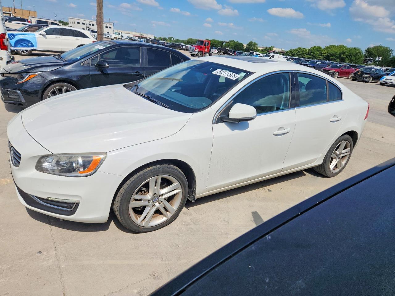 2015 Volvo S60 T5 Drive-E Premier, VIN YV140MFK5F2354282 — Hail