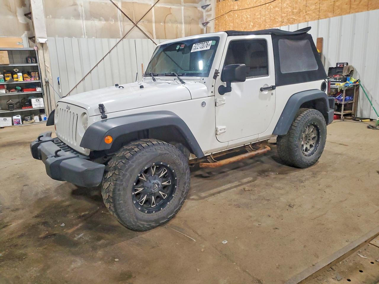 2012 Jeep Wrangler Sport, VIN 1C4AJWAG3CL259682 — Water / flood