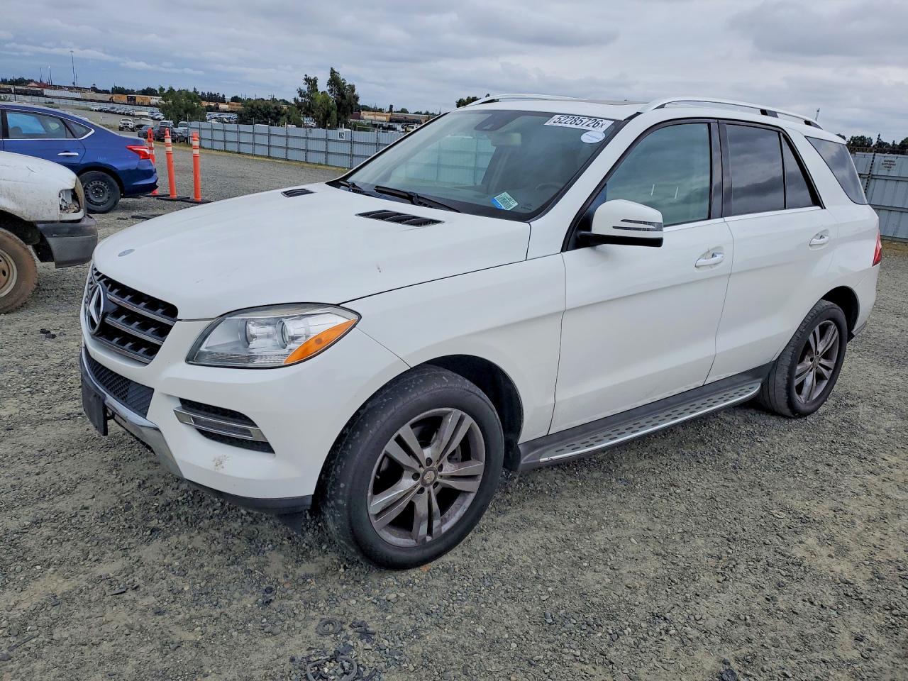 2015 Mercedes-Benz M 350, VIN 4JGDA5HB5FA605311 — Minor dents and scratches