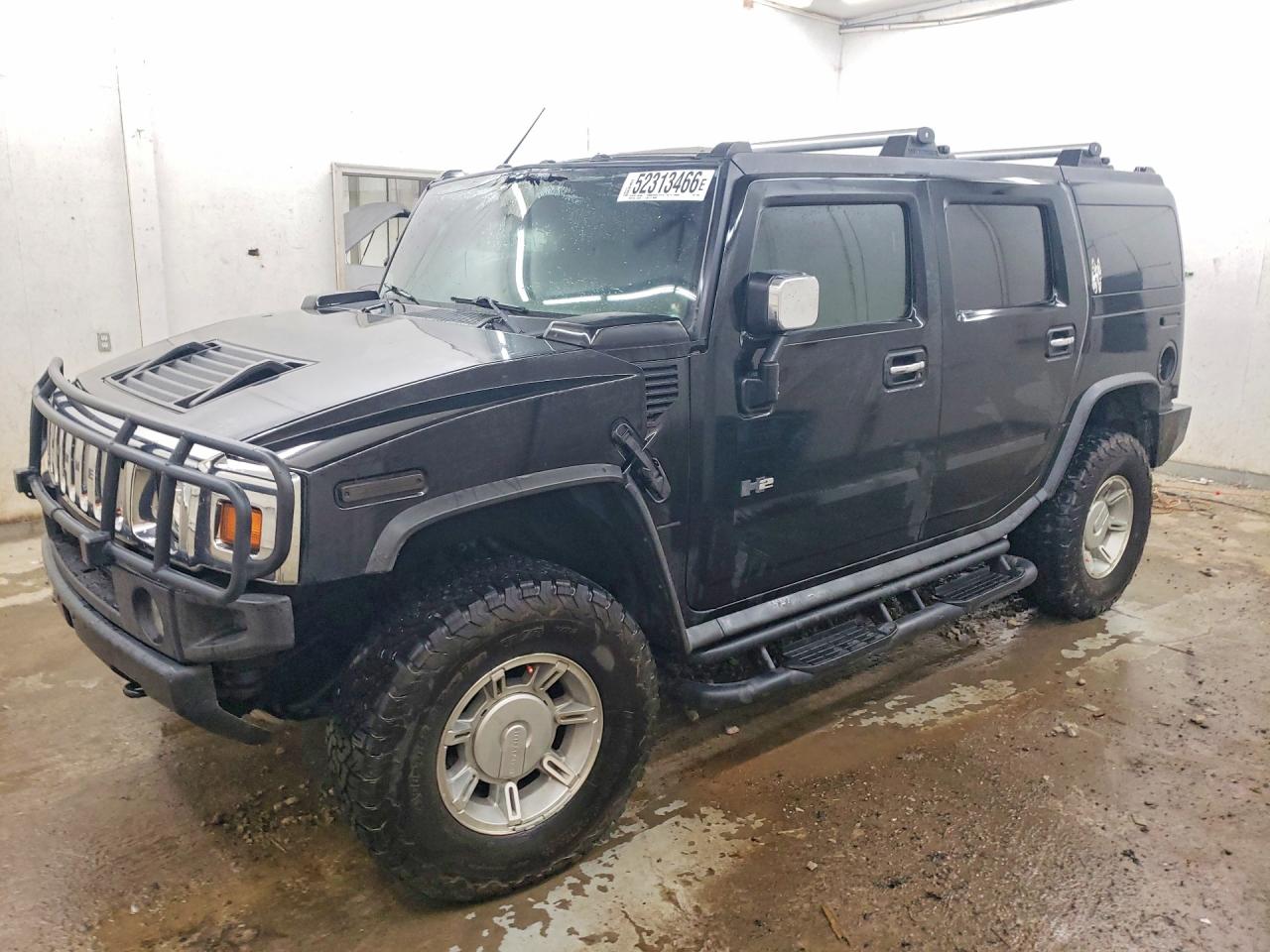 2003 Hummer H2, VIN 5GRGN23U63H115684 — Interior fire