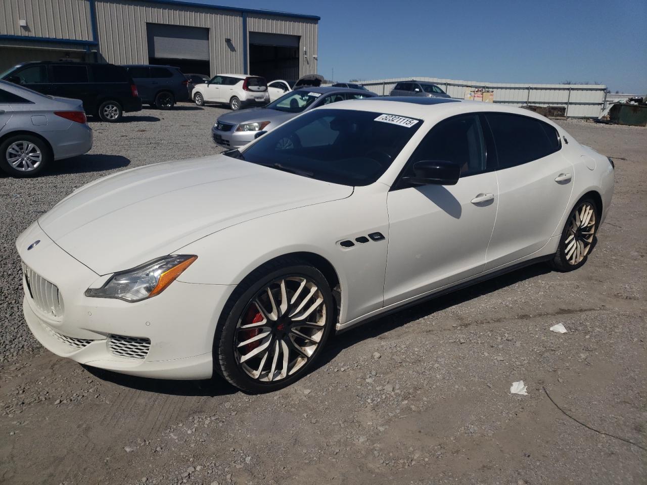 2014 Maserati Quattroporte GTS, VIN ZAM56PPA3E1074957 — Hail
