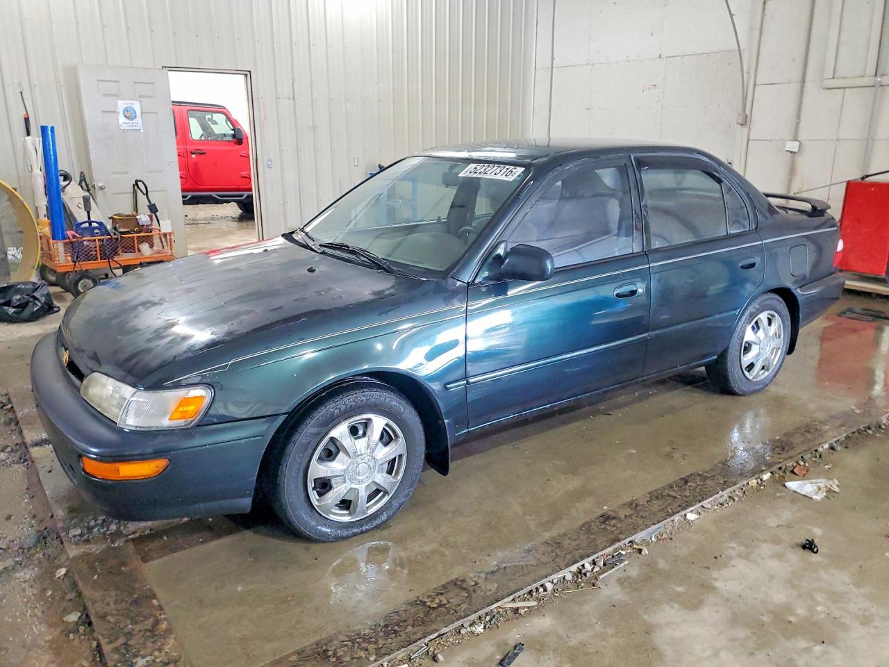 1997 Toyota Corolla DX, VIN 2T1BB02E4VC200484 — Side