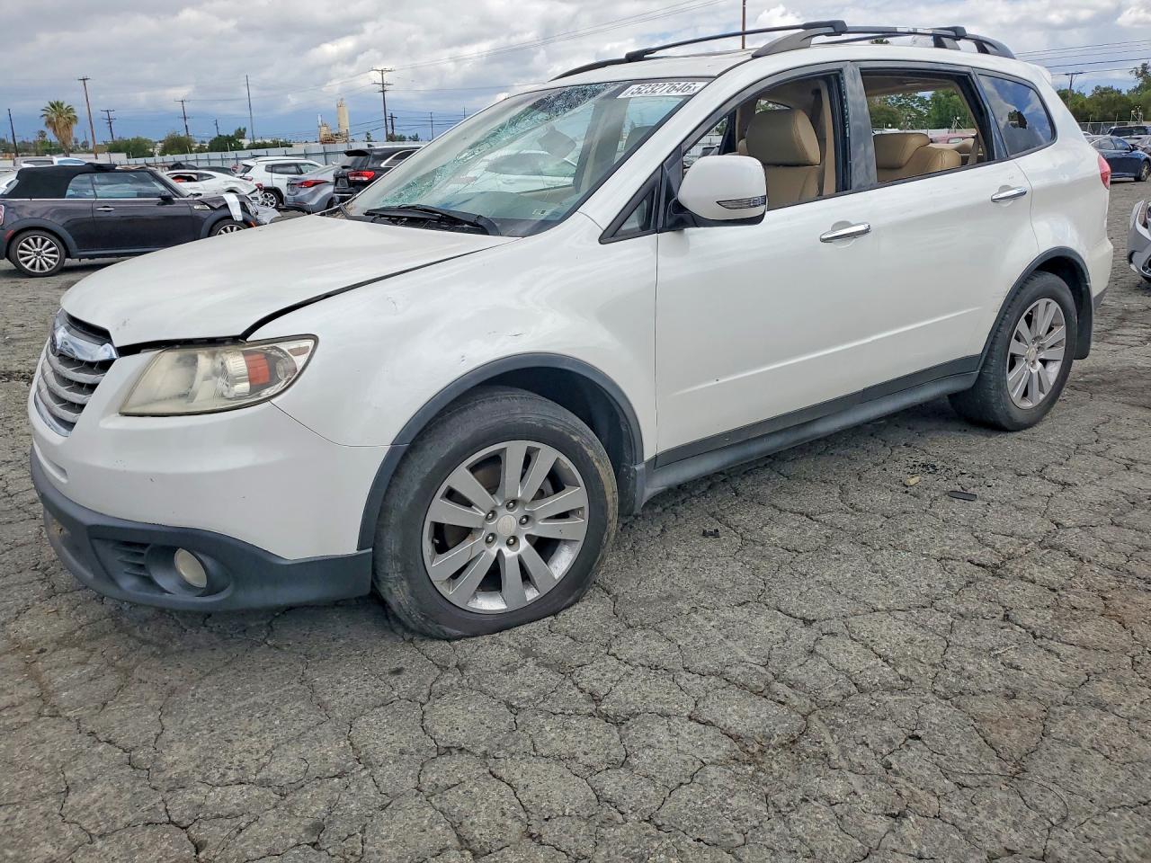 2011 Subaru Tribeca Limited, VIN 4S4WX9GD8B4402486 — Вандализм