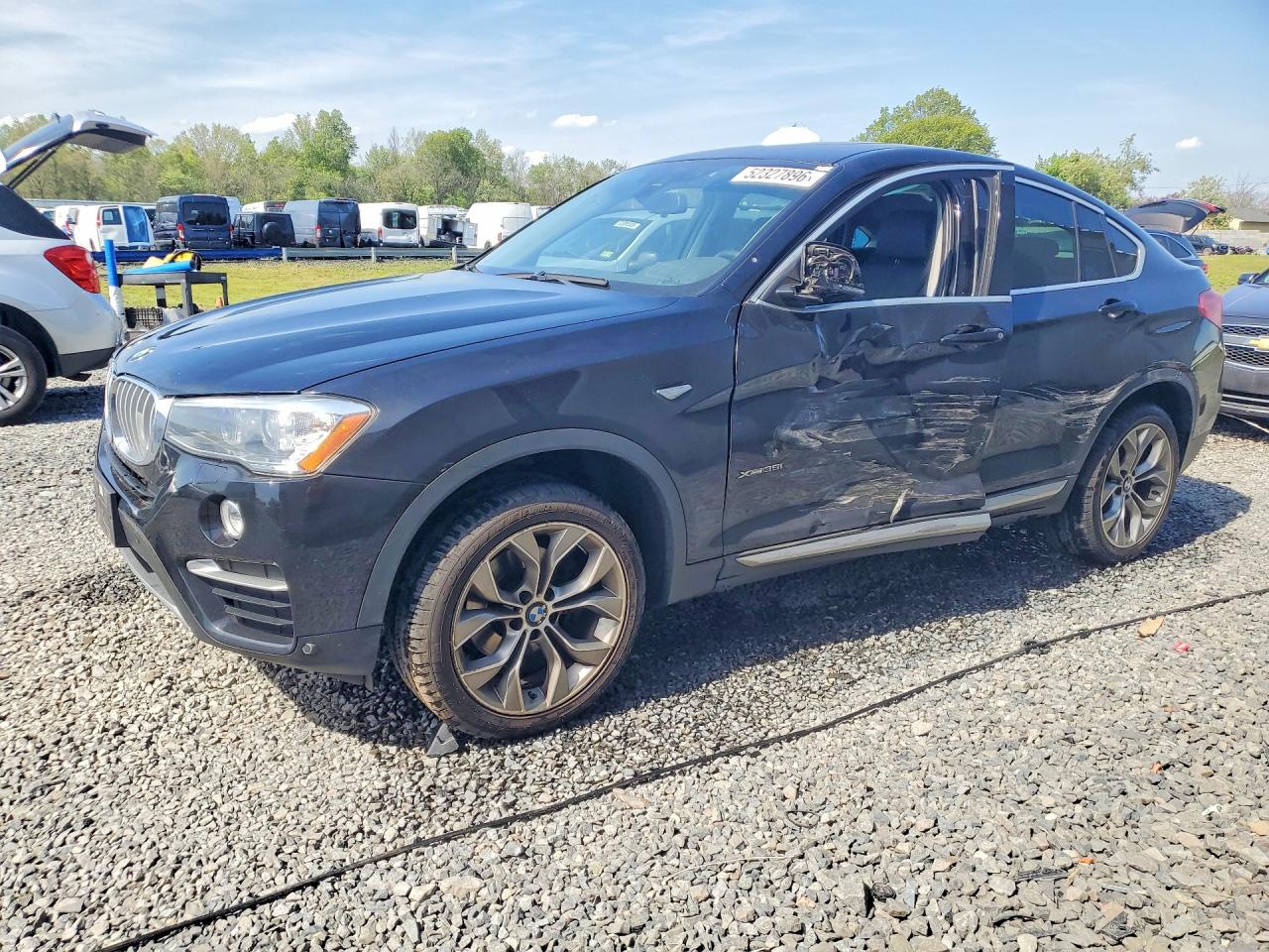 2016 BMW X4 xDrive35i, VIN 5UXXW5C5XG0N92193 — Бок