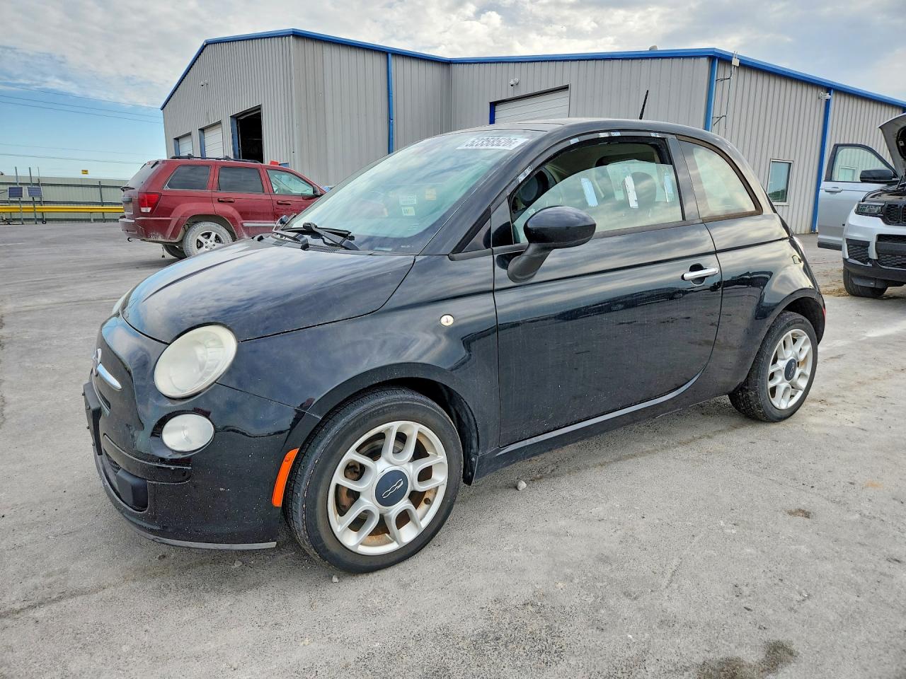 2014 FIAT 500 Pop, VIN 3C3CFFAR4ET229467 — Side