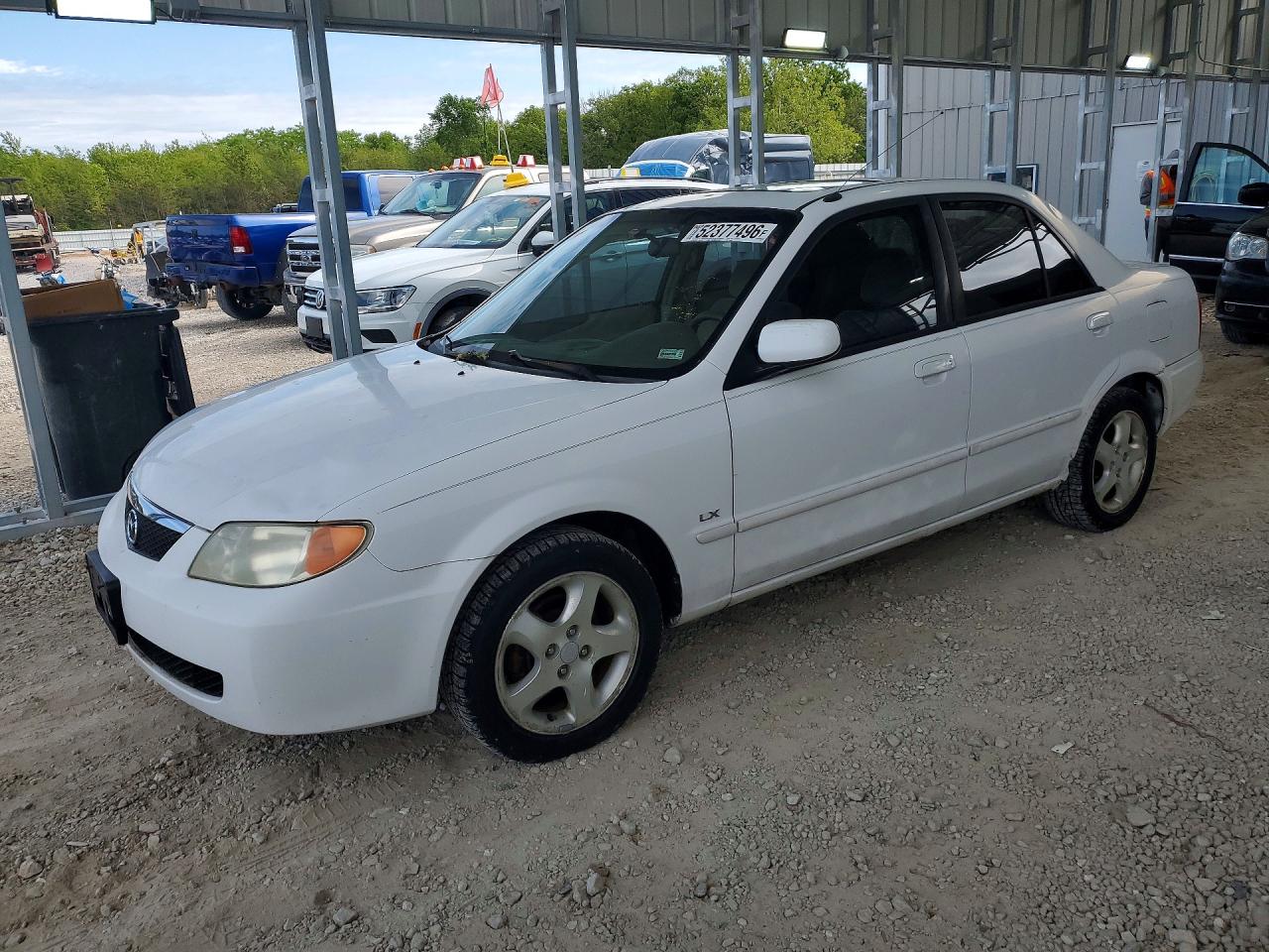2002 Mazda Protege DX, VIN JM1BJ225920559690 — Hail