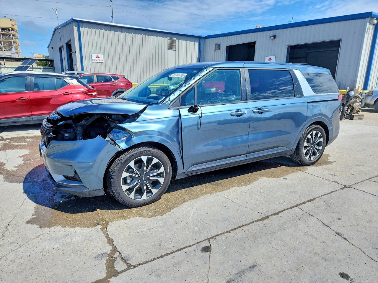 2024 Kia Carnival EX, VIN KNDNC5H31R6431207 — Side