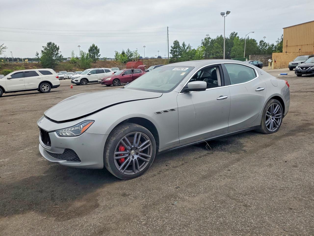 2014 Maserati Ghibli S Q4, VIN ZAM57RTA5E1087823 — Side