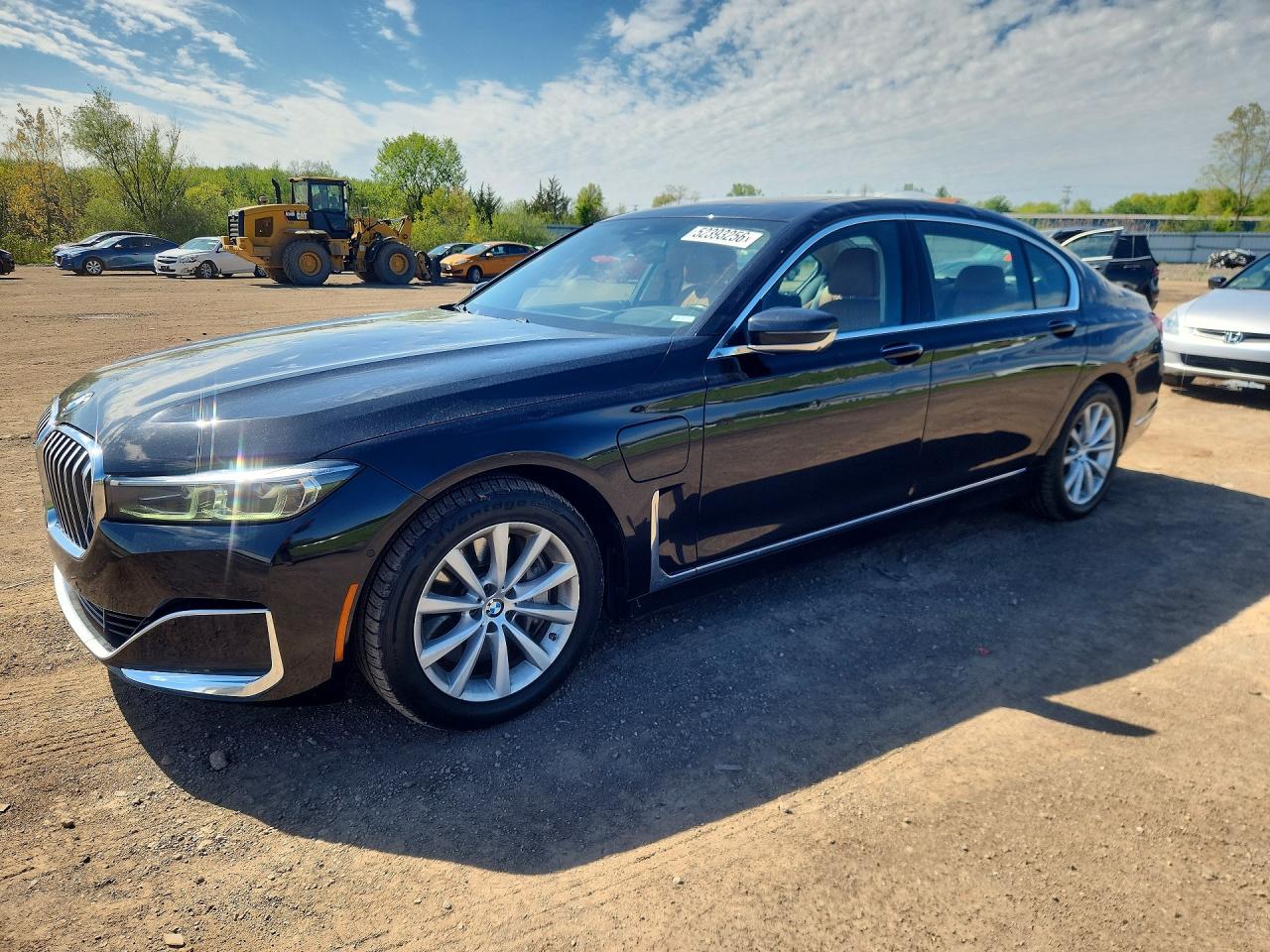 2020 BMW 7 Series 745e xDrive, VIN WBA7W4C08LBM70489 — Hail