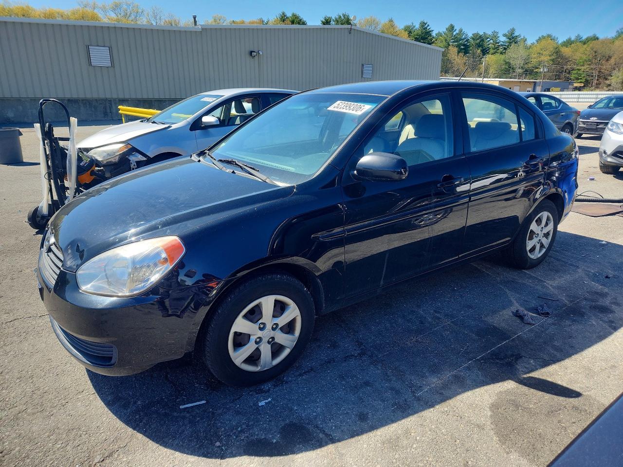 2011 Hyundai Accent GLS, VIN KMHCN4AC6BU534433 — Side