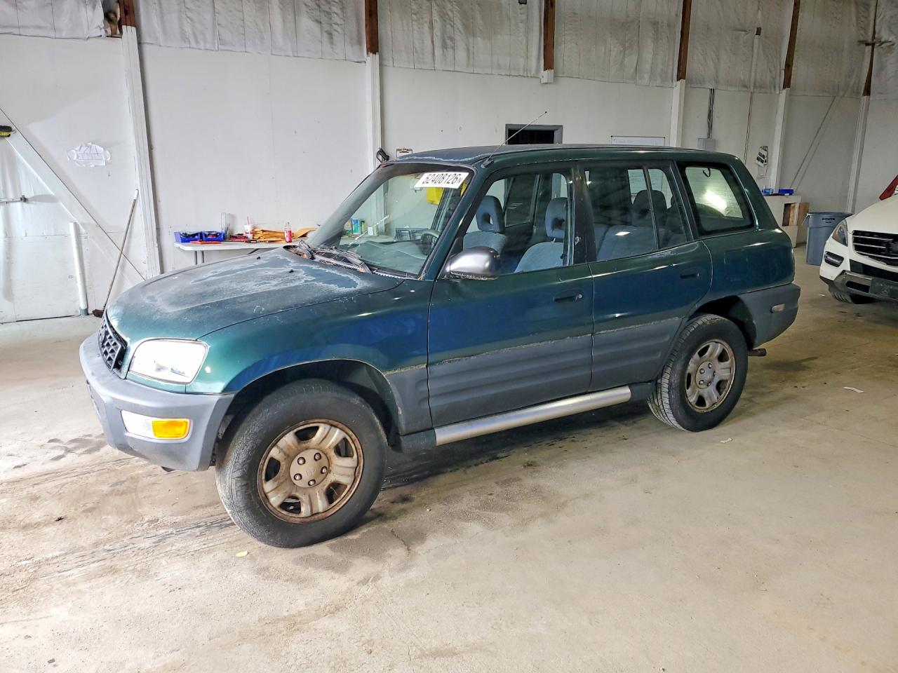 1998 Toyota RAV4, VIN JT3GP10V3W7028536 — Minor dents and scratches