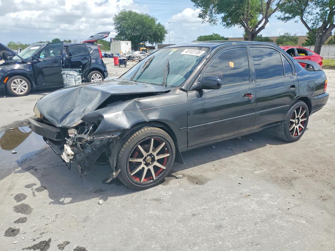 1995 Toyota Corolla, VIN 1NXAE04B1SZ309680 — Front end