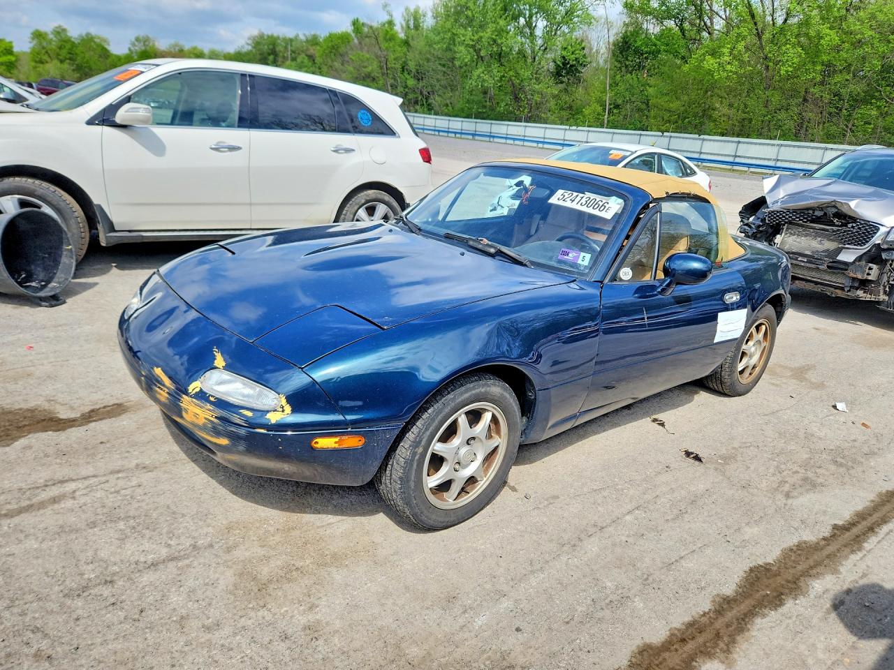 1997 Mazda MX-5 Miata, VIN JM1NA353XV0721814 — Side