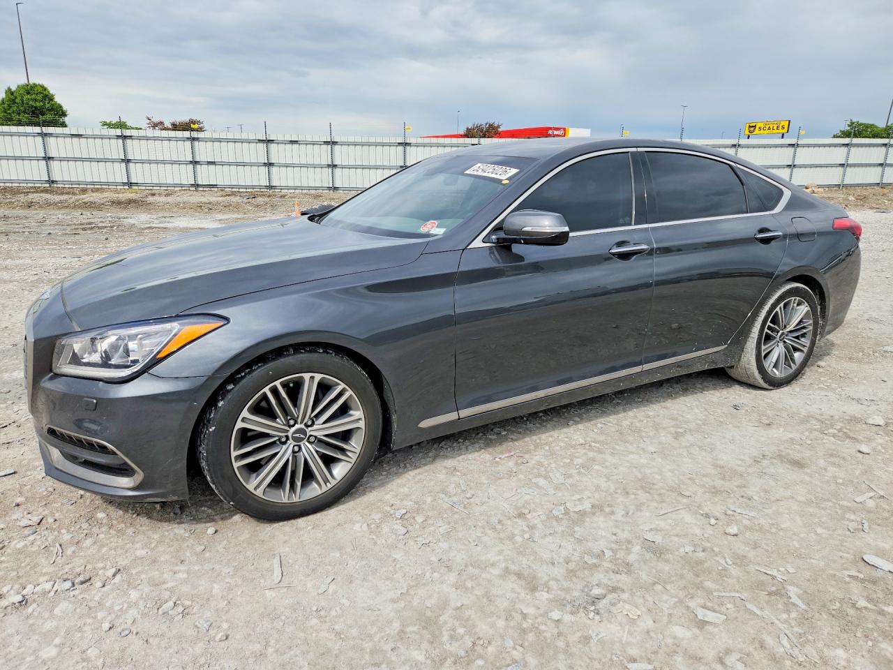 2019 Genesis G80 3.8L, VIN KMHGN4JE3KU299394 — Side