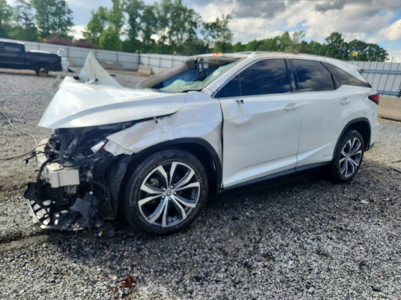 2021 Lexus RX 450hL, VIN JTJHGKFA9M2017042 — Опрокидывание