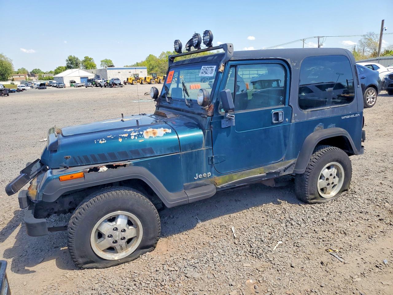 1995 Jeep Wrangler S, VIN 1J4FY19P5SP266062 — Front end