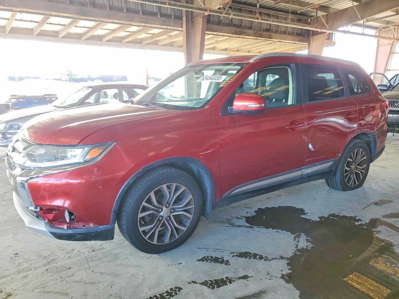 2016 Mitsubishi Outlander SE, VIN JA4AD3A32GZ052068 — Side