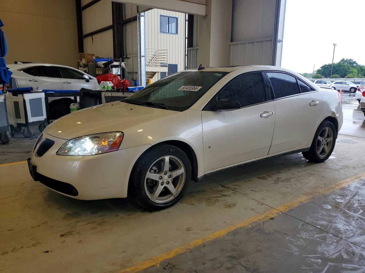 2009 Pontiac G6 1SA, VIN 1G2ZG57NX94112087 — Град