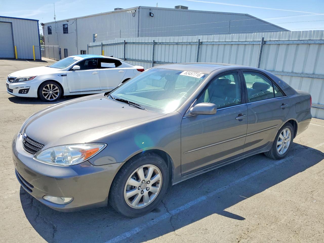 2004 Toyota Camry LE, VIN 4T1BF30K54U583069 — Rear end