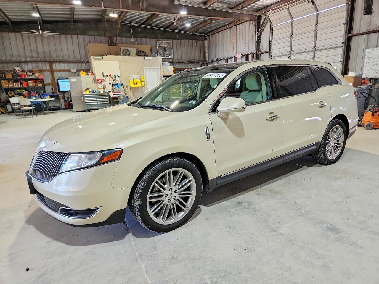 2015 Lincoln MKT EcoBoost, VIN 2LMHJ5AT8FBL00852 — Hail