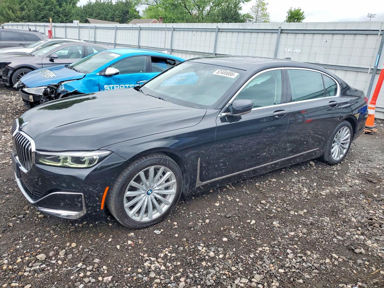 2022 BMW 7 Series 740i xDrive, VIN WBA7T4C0XNCH65392 — Side