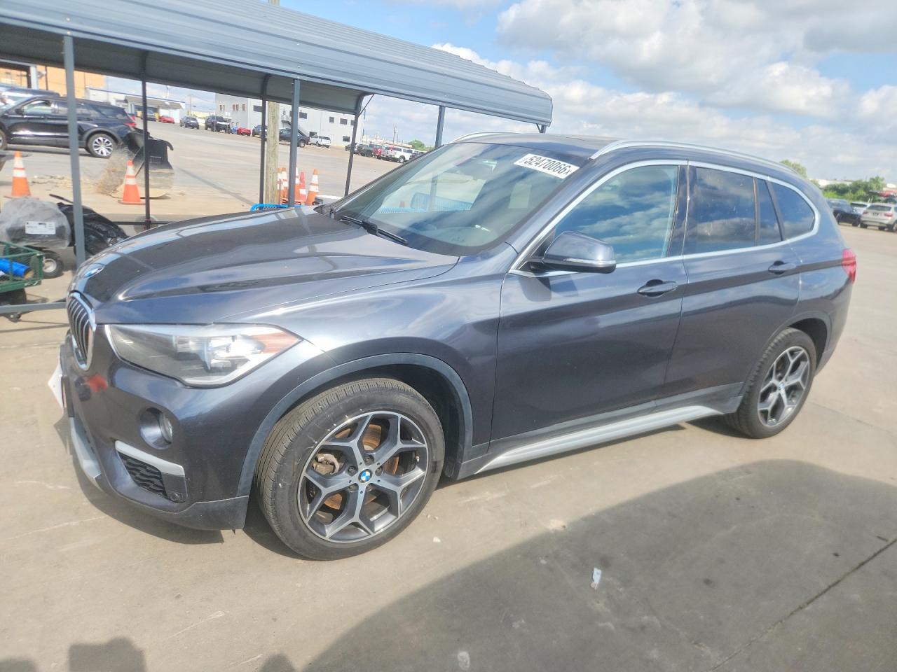 2019 BMW X1 sDrive28i, VIN WBXHU7C56K3H44457 — Side