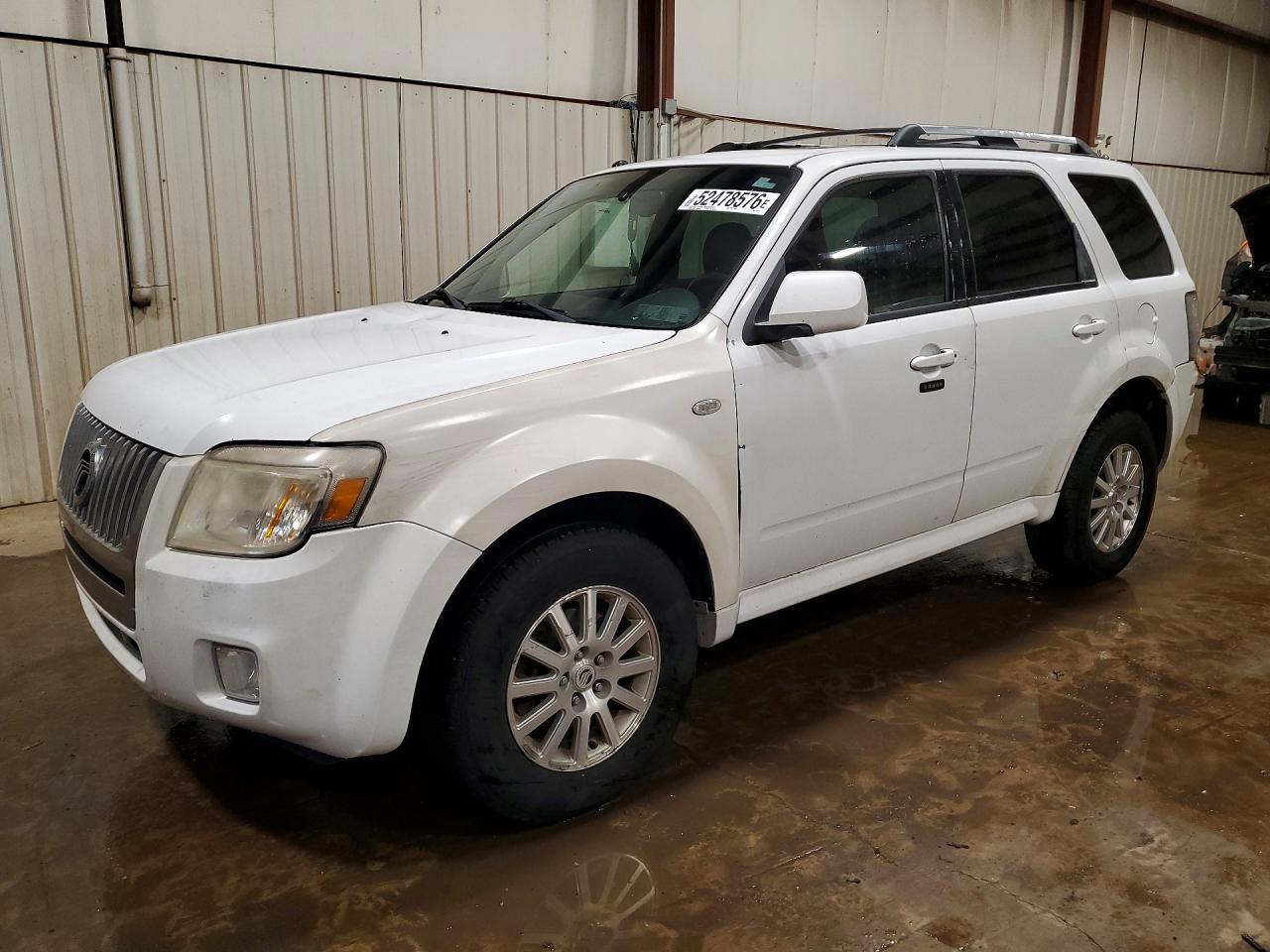 2008 Mercury Mariner Premier, VIN 4M2CU97108KJ49572 — Зад