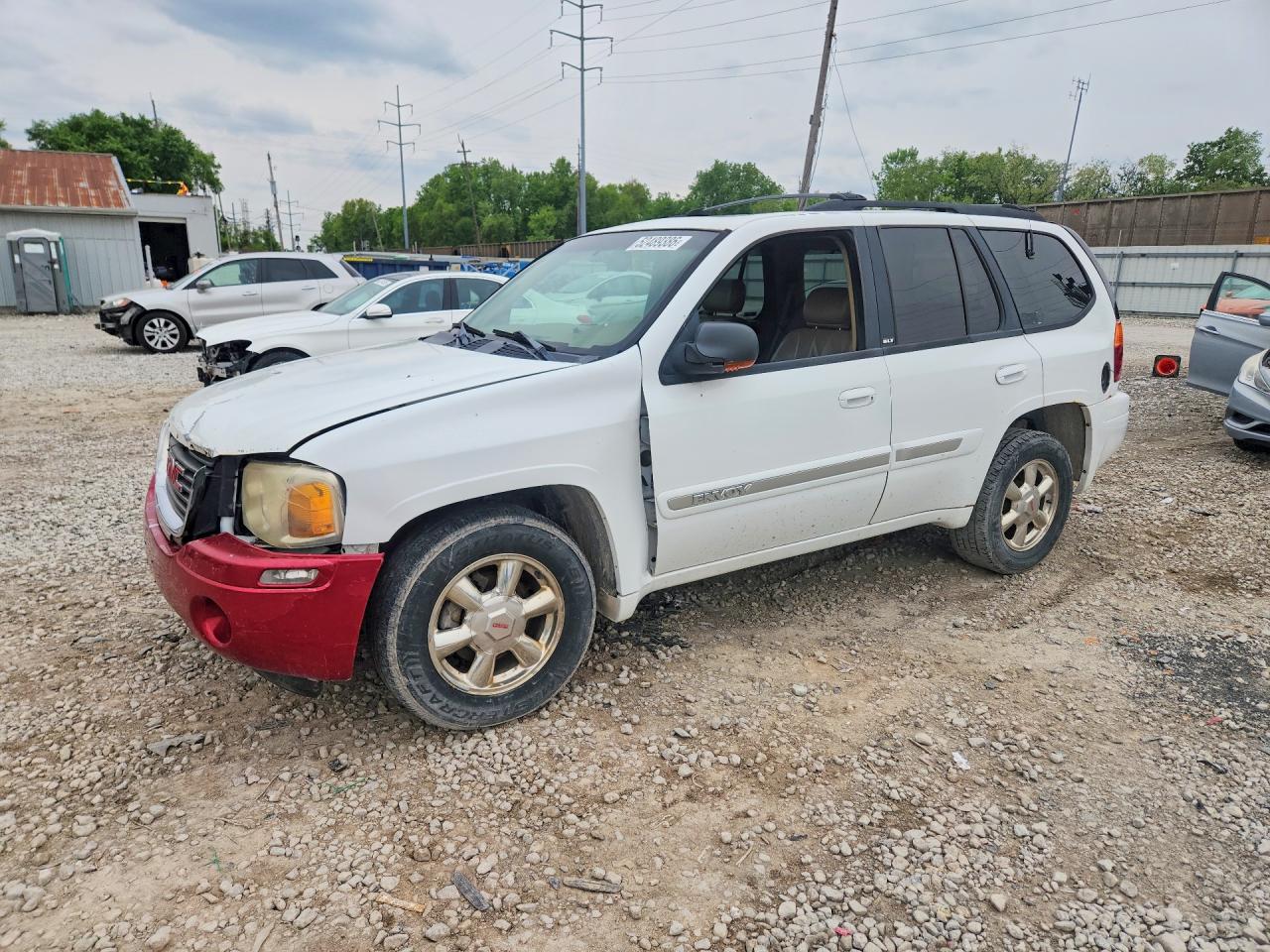 2002 GMC Envoy SLE, VIN 1GKDT13S722289885 — Front end