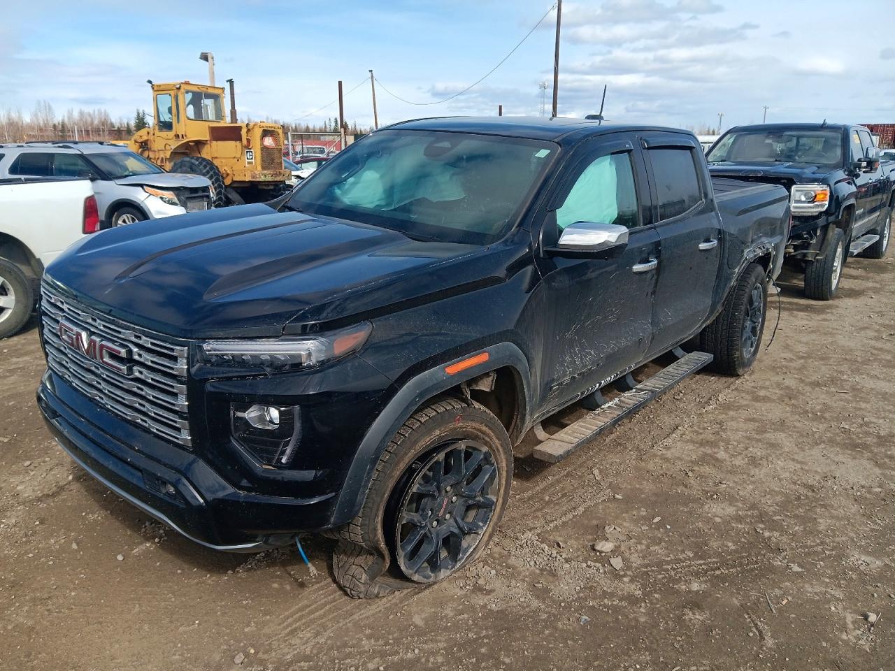 2024 GMC Canyon 4WD Denali, VIN 1GTP6FEK3R1228155 — Side