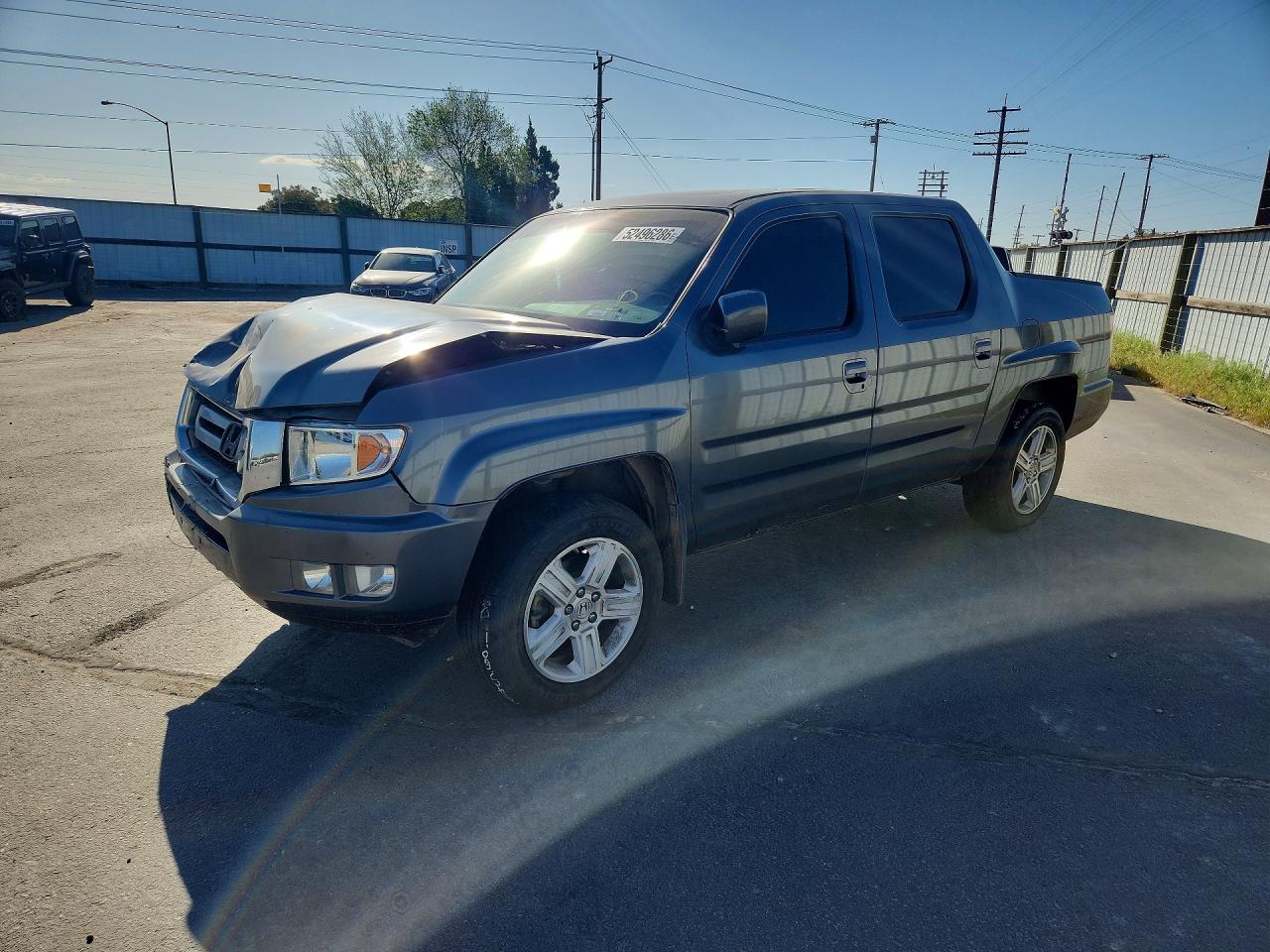 2011 Honda Ridgeline RTL, VIN 5FPYK1F58BB453705 — Front end