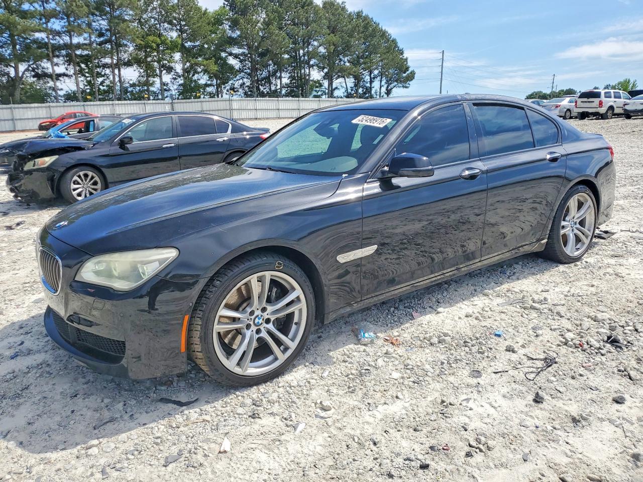 2013 BMW 7 Series 750i, VIN WBAYA8C56DC996797 — Rear end