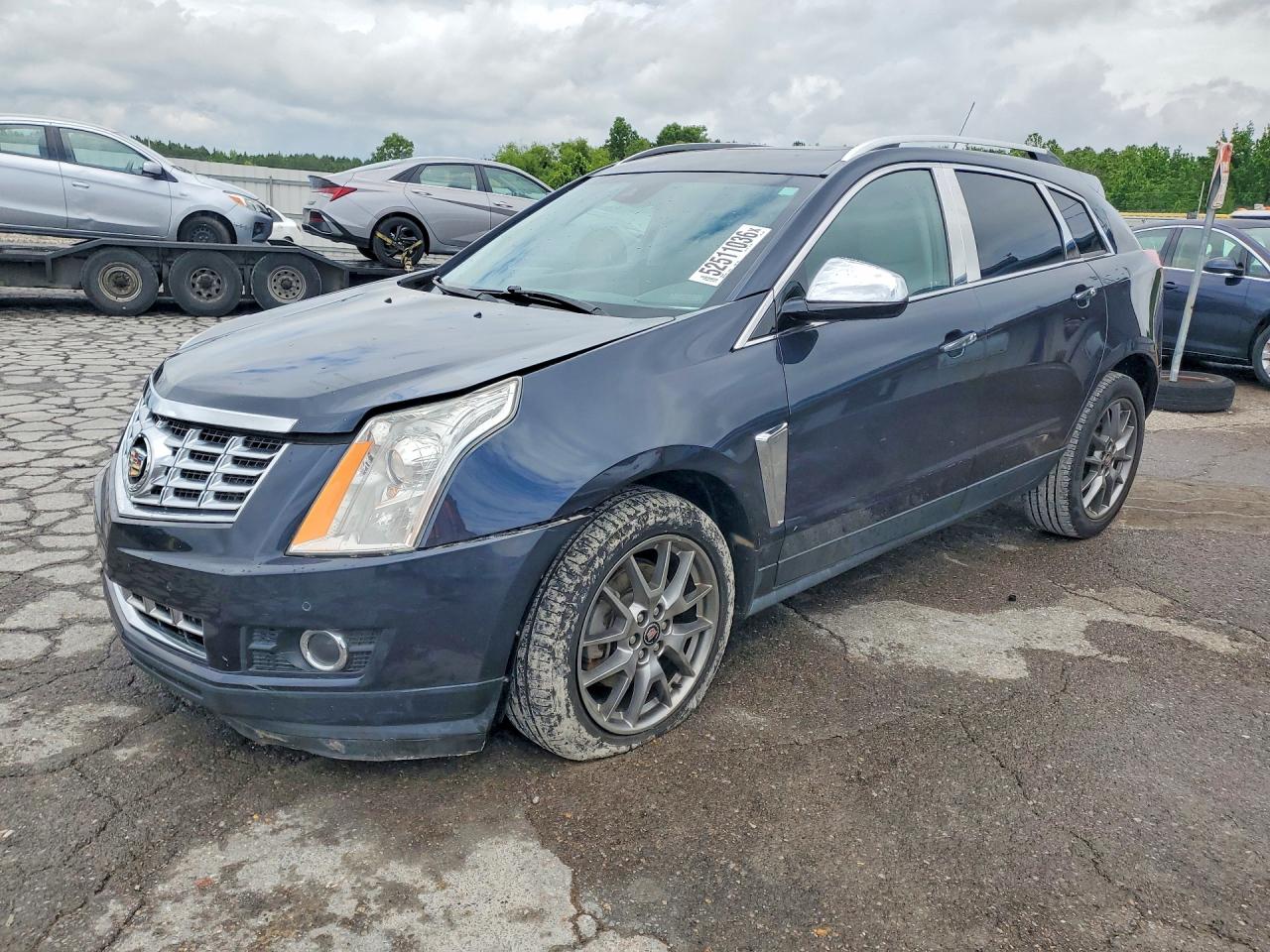 2016 Cadillac SRX Premium Collection, VIN 3GYFNDE31GS563206 — Minor dents and scratches